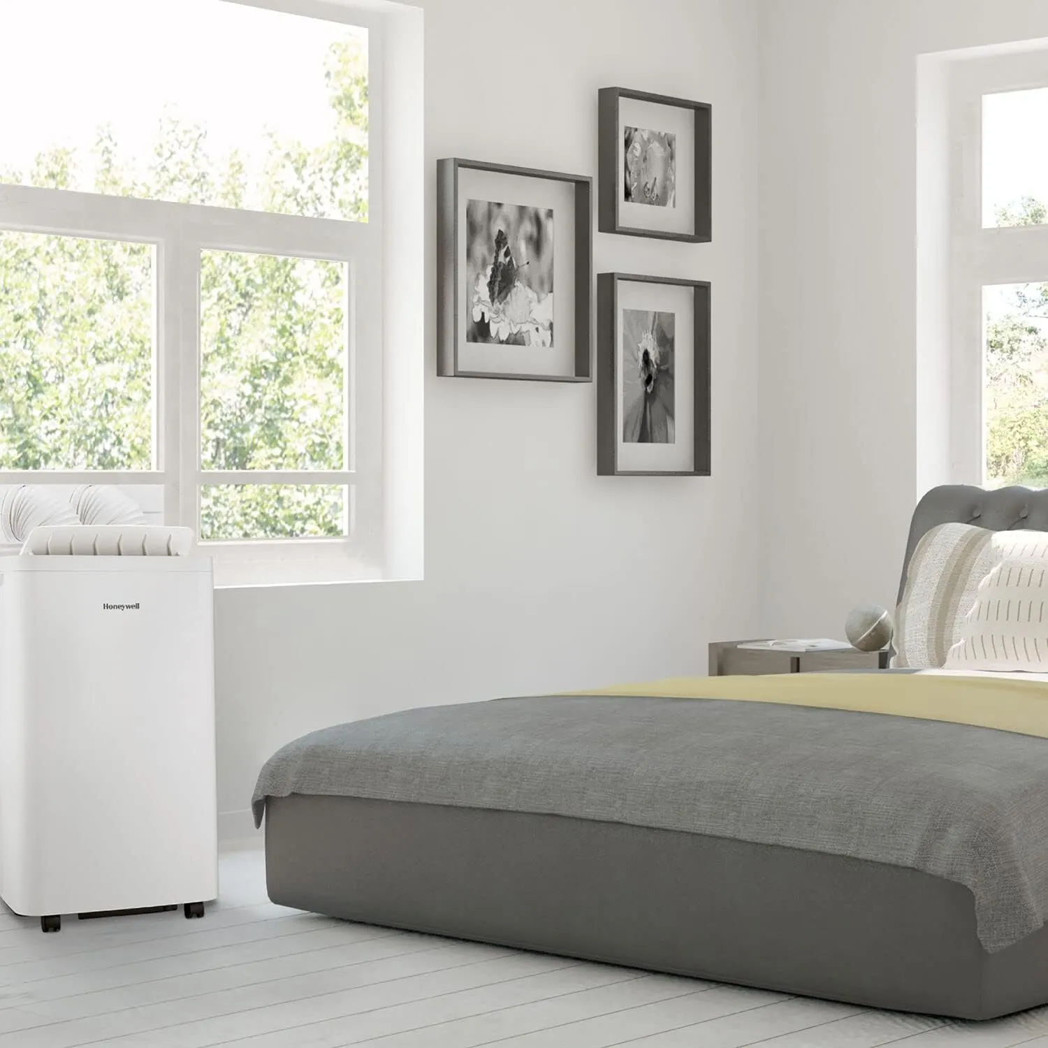 Honeywell 14,500 BTU / 101 Pint Portable Air Conditioner and Dehumidifier, Cools Rooms Up to 700 Sq. Ft., (White)